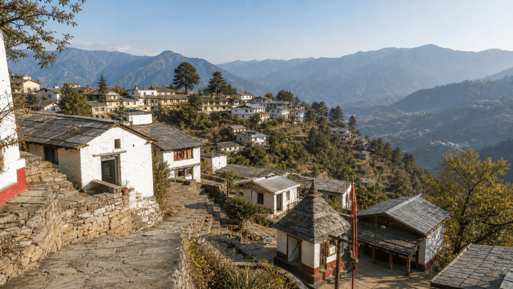 Almora heritage hill town with traditional rooftops and Himalayan ridge views